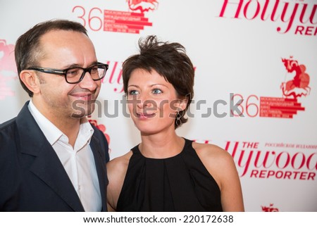 MOSCOW - JUNE, 25: Film Director Andrey Zvyagintsev (Film Leviathan) with wife. White party Hollywood Reporter Magazine at River Restorant, June 25, 2014 in Moscow, Russia