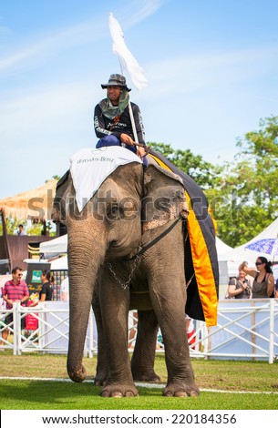 HUA HIN, THAILAND - AUGUST 28: Unidentified mahout.  Elephant polo games during the 2013 King \'s Cup Elephant Polo match on August 28, 2013 at Suriyothai Camp in Hua Hin, Thailand.