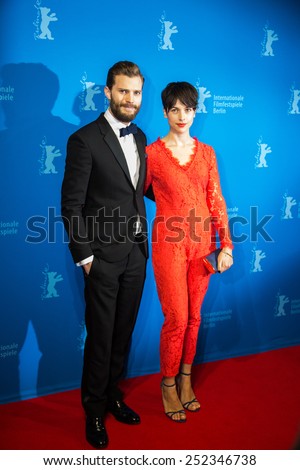 BERLIN, GERMANY - FEBRUARY 11: Actor Jamie Dornan with Amelia Warner, \'Fifty Shades of Grey\' premiere. 65th Berlinale International Film Festival at Zoo Palast on February 11, 2015 in Berlin, Germany.