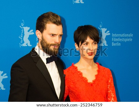 BERLIN, GERMANY - FEBRUARY 11: Actor Jamie Dornan with Amelia Warner, 'Fifty Shades of Grey' premiere. 65th Berlinale International Film Festival at Zoo Palast on February 11, 2015 in Berlin, Germany.