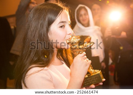 BERLIN, GERMANY - FEBRUARY 14: Solmaz Panahi, Niece of Jafar Panahi with golden bear for \'Taxi\'. Closing Ceremony. 65th Berlinale at Berlinale Palace on February 14, 2015 in Berlin, Germany.