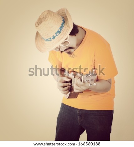 vintage man with ukulele isolated