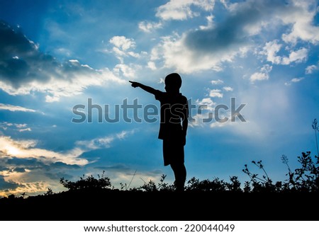 kid silhouette,Moments of the child\'s joy. looking for future, On the Nature sunset