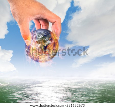 Climate change,Global warming, fire global put in water, safe the earth concept