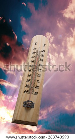 Wooden thermometer on the sky , Hot weather
