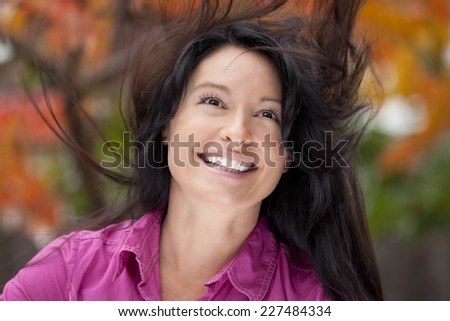 Close-up  Of A Mature Women Cheerful Enjoying The Peace And Love