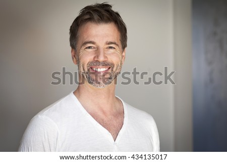 Portrait of a mature man smiling at the camera