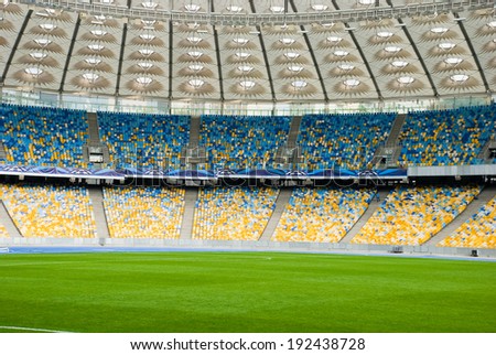 KIEV (KYIV), UKRAINE - October 04, 2012: Empty chairs on a soccerl stadium before a football match.
