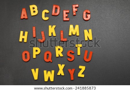 letters of the alphabet arranged on a blackboard