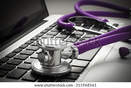stethoscope on laptop