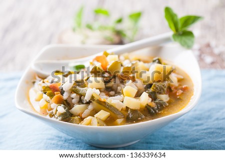 Delicious hot vegetarian meal with fresh herbs