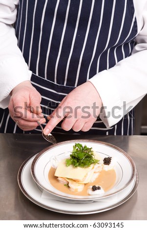 Chef adds caviar to the seafood lasagna