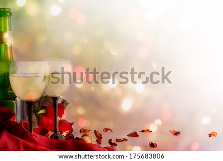 Wine, wine glasses and roses on a color background