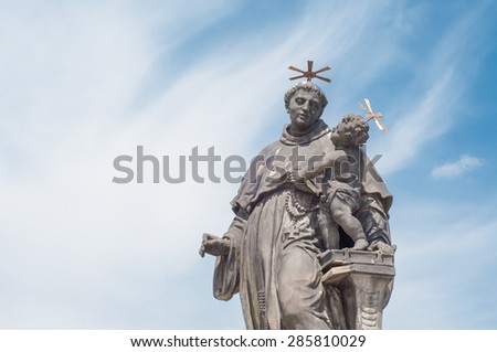statue of St. Anthony from Padova on charles bridge in a sunny day