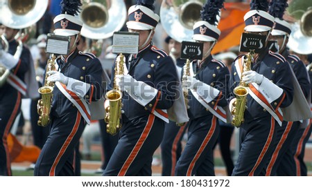 CHAMPAIGN,IL-SEPTEMBER 28: University of Illinois band members perform for half-time during a game against Miami-OH on Saturday, Sept 28, 2013.