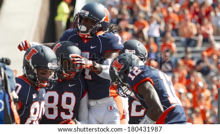CHAMPAIGN,IL-SEPTEMBER 28: University of Illinois Fighting Illini football players celebrate a touch down during a game against Miami-OH on Saturday, Sept 28, 2013.