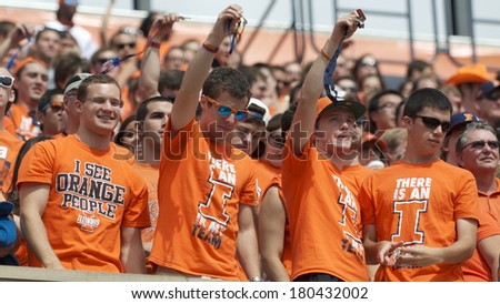 CHAMPAIGN,IL-SEPTEMBER 28: University of Illinois students jingle keys in an attempt to distract the opposing team during a game on Saturday, Sept 28, 2013.
