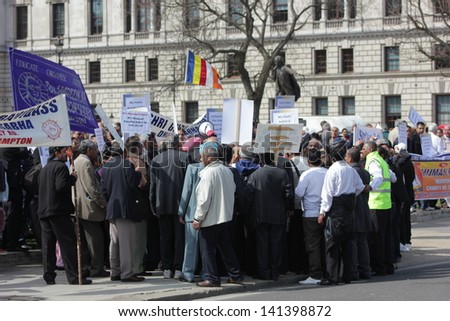 LONDON - APRIL 23: Members of the British Sikh community protest changes to Indian law regarding the caste system, outside the UK house of commons on April 23, 2013 in London.