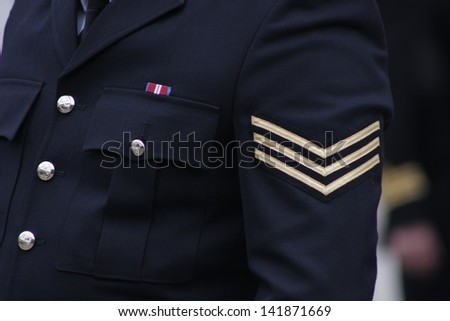 LONDON - APRIL 17: A Police officer in formal uniform oversees the public during the funeral service for Margaret Thatcher at St. Paul\'s Cathedral on April 17, 2013 in London.