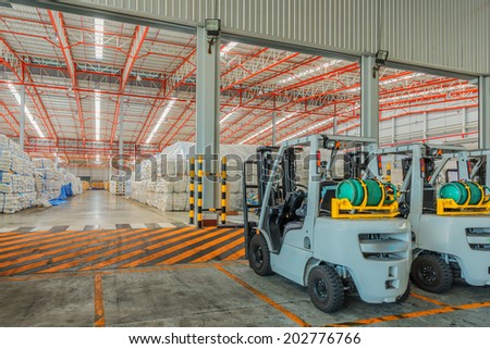 forklift at the large modern warehouse forklift at the large modern warehouse