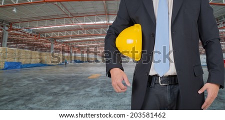 engineer yellow helmet for workers security in the construction site warehouse