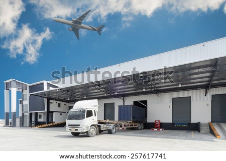 Truck at warehouse building for Logistic Import Export .
