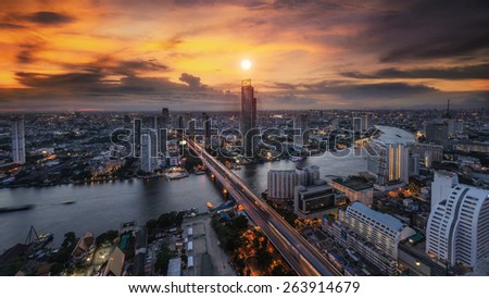 Landscape of River in Bangkok city in night time with bird view.