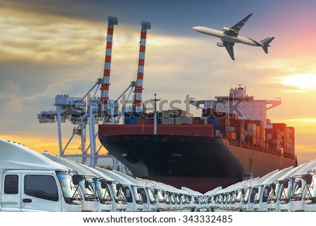container ship in import,export port against beautiful morning light of loading ship yard use for freight and cargo shipping vessel transport