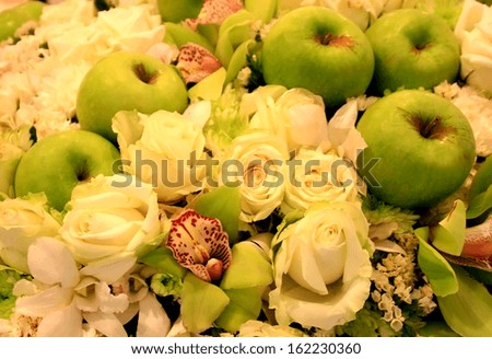 flower bouquet and apple