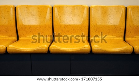 Yellow chair,chair in electric train
