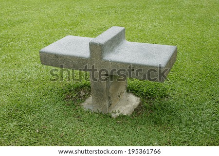 stone bench on grass land