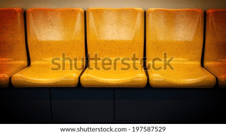 Yellow chair,chair in electric train