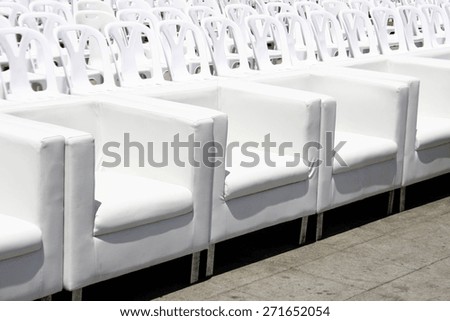 Empty with white armchairs and plastic chair outdoor event