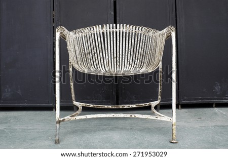 wire chair on the concrete floor