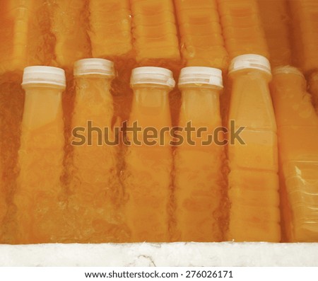 Ice Cold Orange Juice Bottle