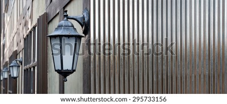 white Corrugated metal texture surface or galvanize steel background and lamp