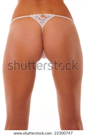 stock photo sexy woman's bottom in white thong from behind on white 