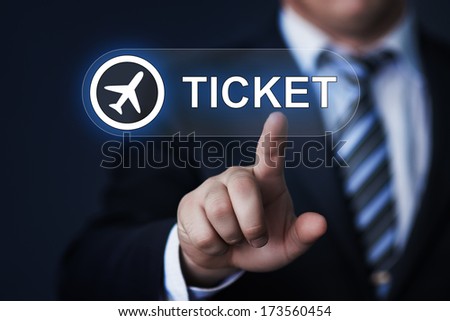 business technology internet and networking concept businessman pressing ticket button on virtual screens business technology internet and networking concept businessman pressing ticket button on virtual screens