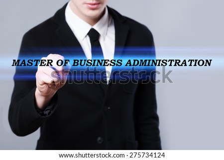 business, technology and internet concept - businessman is writing master of business administration text