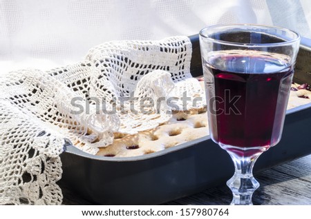 Homemade cherry pie with a knitted cloth. From the series 