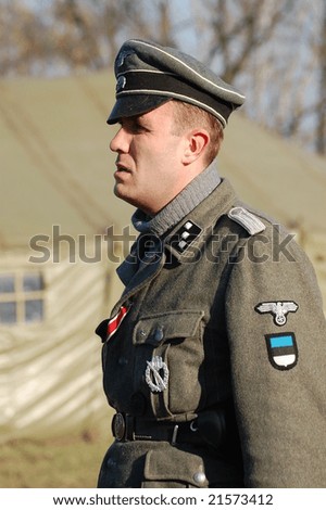 KIEV,UKRAINE - NOV 8: Person in German WW2 military uniform. Member of military history club Red Star. Historical military reenacting Kiev ,Ukraine. 7-9 November 2008