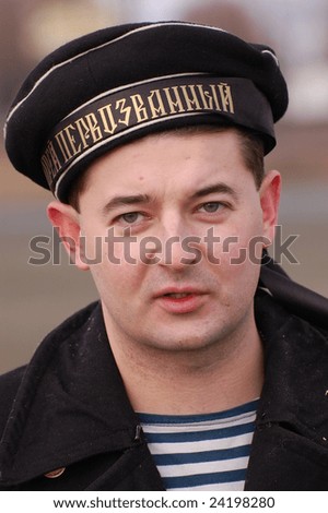 KIEV, UKRAINE - FEBRUARY 2, 2008. A member of the military history reenactment club, Red Star, wears a military Russian Civil War sailor uniform circa 1918 in Kiev, Ukraine on February 2, 2008.