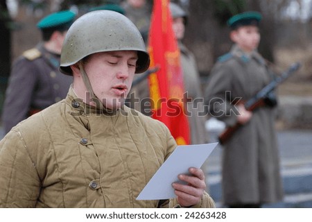KIEV, UKRAINE - FEB 23, 2008:  Military history club Red Star.Red Army Day celebration. Person in Soviet WW2 military uniform. Historical  reenacting in Kiev, Ukraine, February 23, 2008.