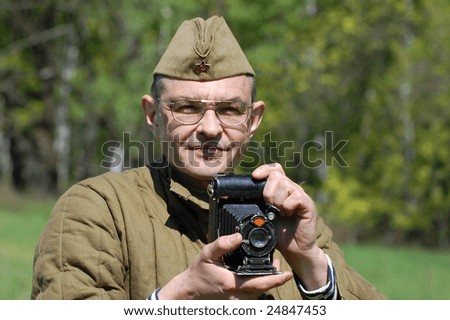 KIEV, UKRAINE - MAY 23: A member of the history club called Red Star wears a historical uniform as he participates in a WWII reenactment. May 23, 2008 in Kiev, Ukraine.