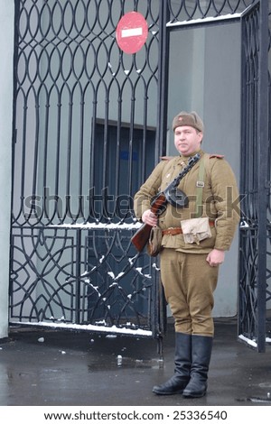KIEV, UKRAINE - FEB. 20: A member of the history club called Red Star wears a historical uniform as he participates in a WWII reenactment. February 20, 2009 in Kiev, Ukraine.