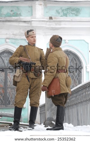KORSUN, UKRAINE - FEB. 20: A member of the history club called Red Star wears a historical Soviet uniform as he participates in a WWII reenactment. February 20, 2009 in Korsun, Ukraine.