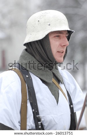 KIEV, UKRAINE - FEB 20: A member of a history club called Red Star wears a historical Soviet uniform as he participates in a WWII reenactment in Kiev, Ukraine February 20, 2009.