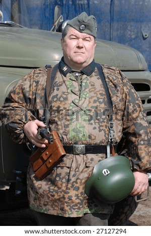 Person in SS field uniform. Military reenacting