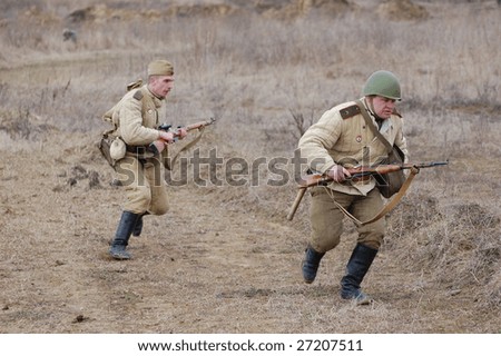 VINNITSA, UKRAINE - MAR 21: A member of history club called Red Star wears historical Soviet uniform as he participates in a WWII reenactment in Vinnitsa, Ukraine on March 21, 2009.