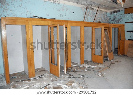 Chernobyl area. Lost city Pripyat. Modern ruins. Post-office. Phone-boxes.Ukraine. Kiev region.